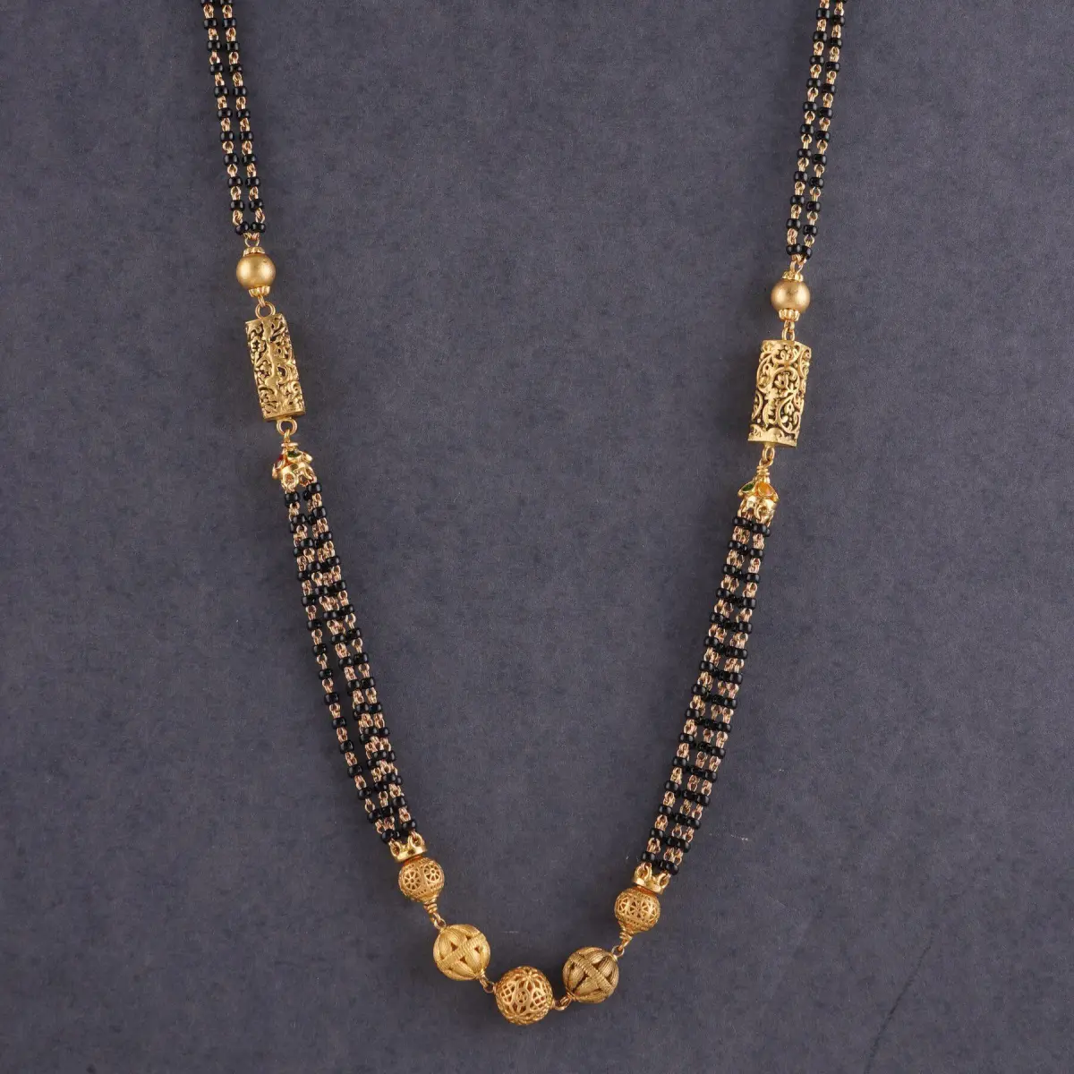 Beautiful Gold Small Mangalsutra for Ladies with Triangles Design