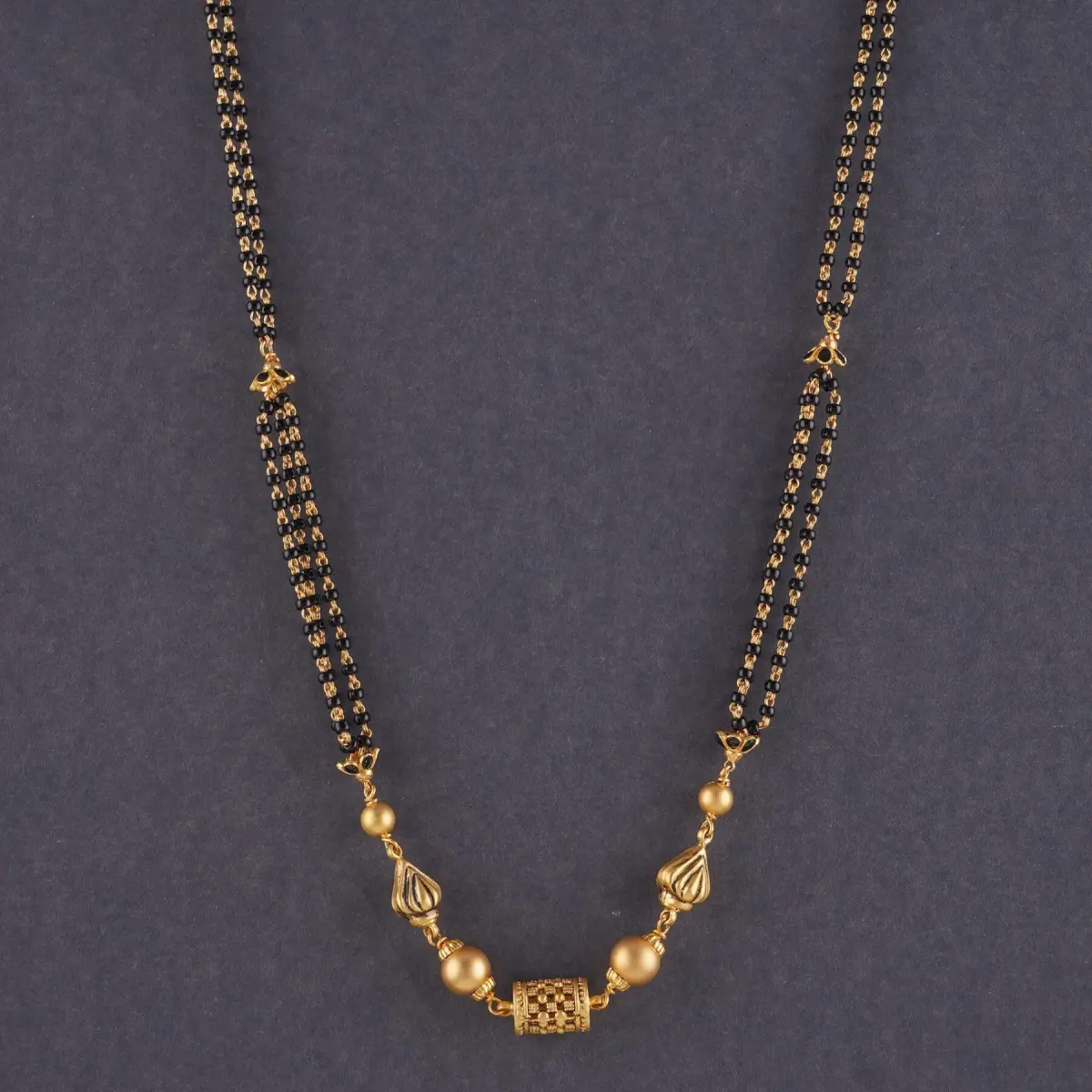 Elegant Gold Small Mangalsutra for Ladies with fabulous Design & Red Stone