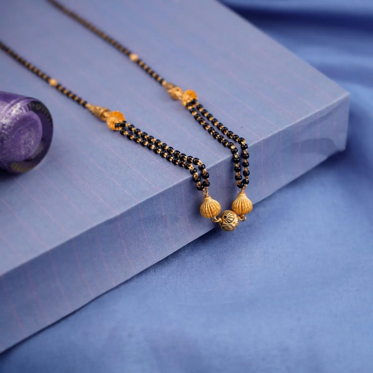 Beautiful Gold Small Mangalsutra in Amazing Design for Ladies