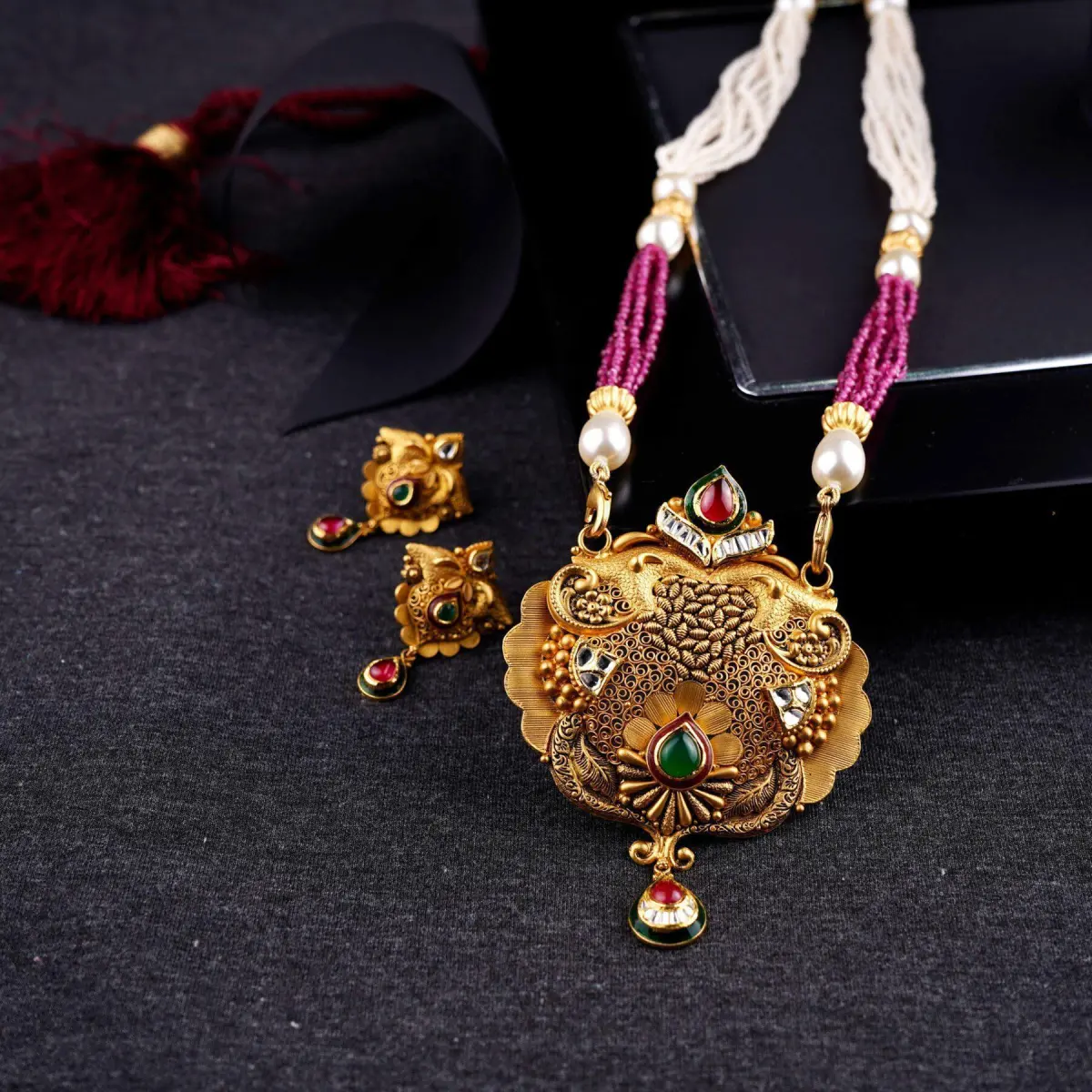 Amazing Gold Pendant Set for Ladies with Elegant work in Antique Design