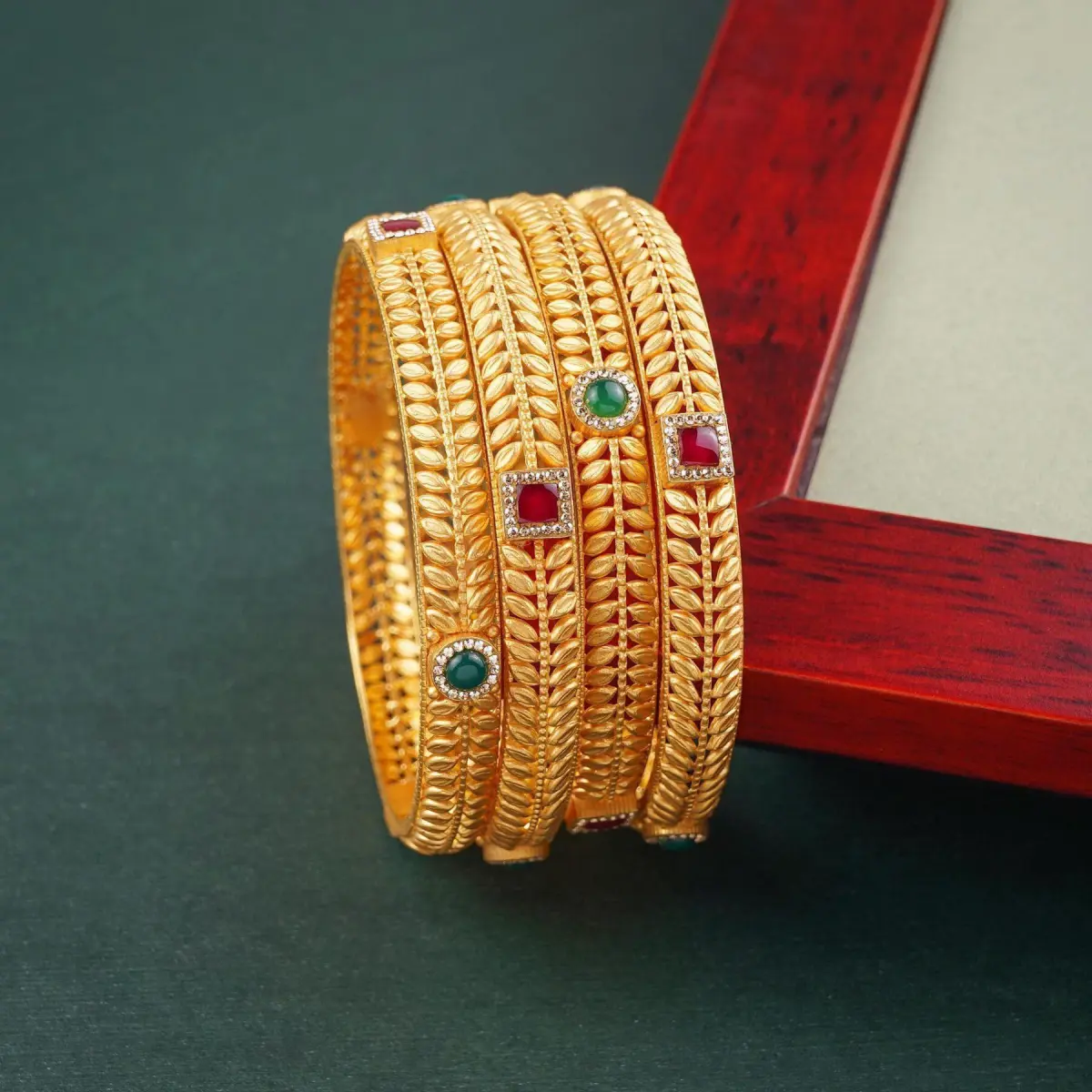 Gold Fancy Antique Bangles for Ladies in Leaf Design with Beautiful Stones