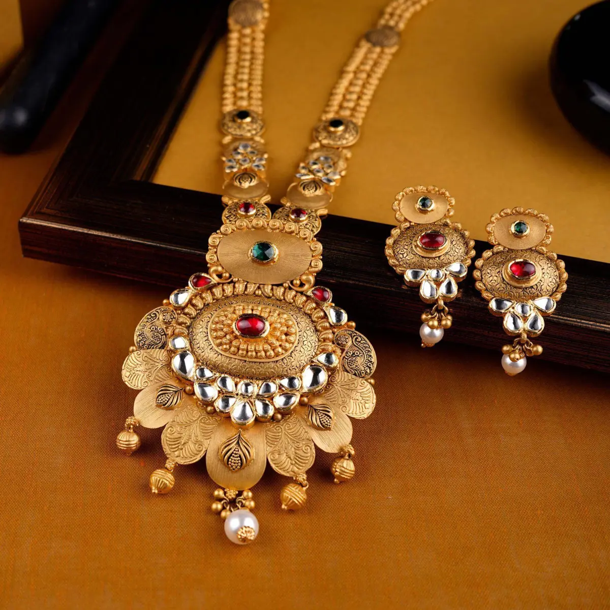 Beautiful Gold Ranihar Set with Kundan work for Ladies in Flowers & Leaf Design
